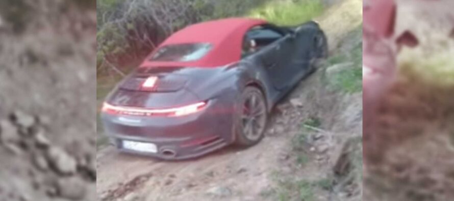 Κακομεταχειρίζεται μια Porsche στο βουνό (video)
